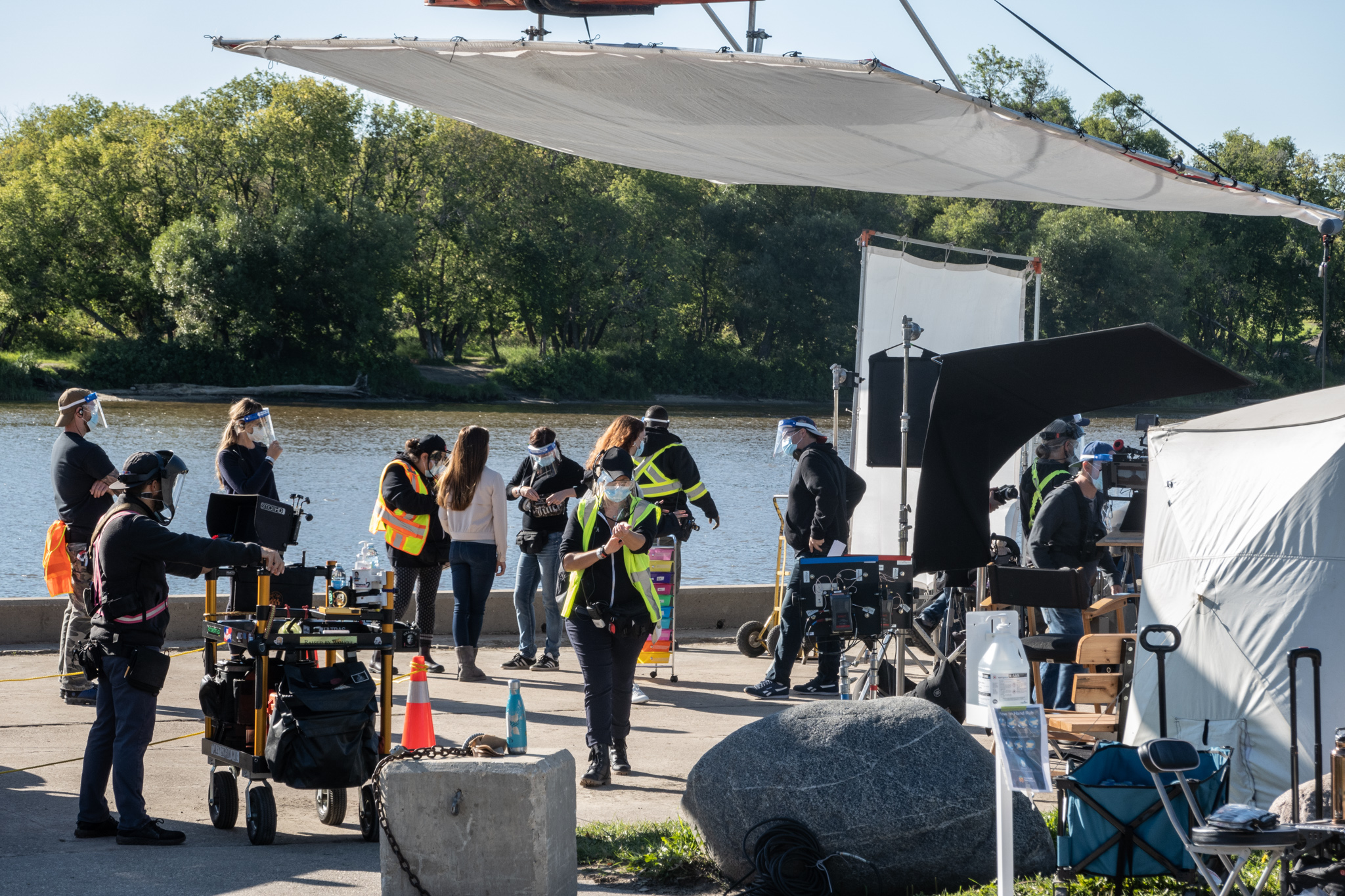 film crew setting up along the water front