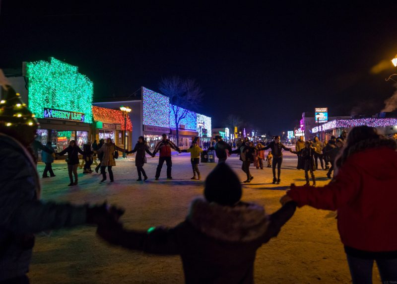 community round dance outside in winter