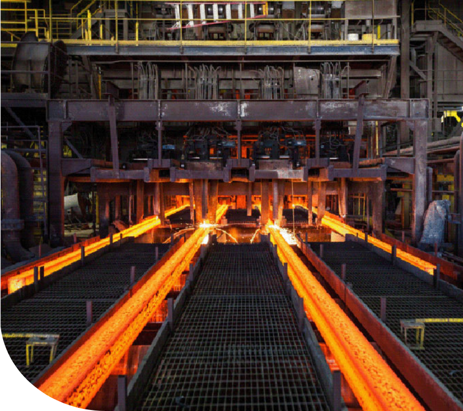 Gerdau steel facility showing a dark room with hot orange steel and sparks.